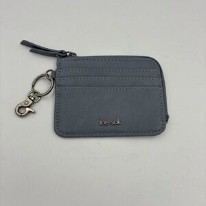 The SAK Iris gray leather card ID wallet zip around closure